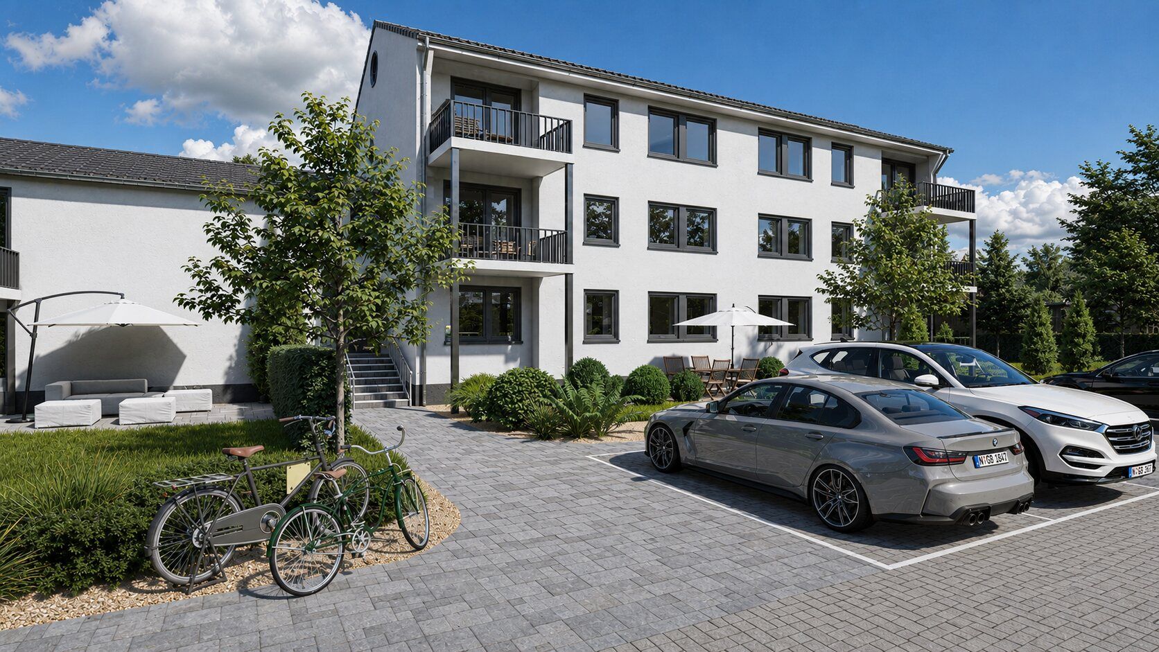 Visualisierung der Südansicht mit Zufahrt und Stellplätzen in Tirschenreuth